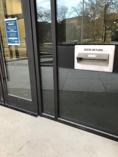 Hillman Library's Bookdrop, located outside of the entrance doors